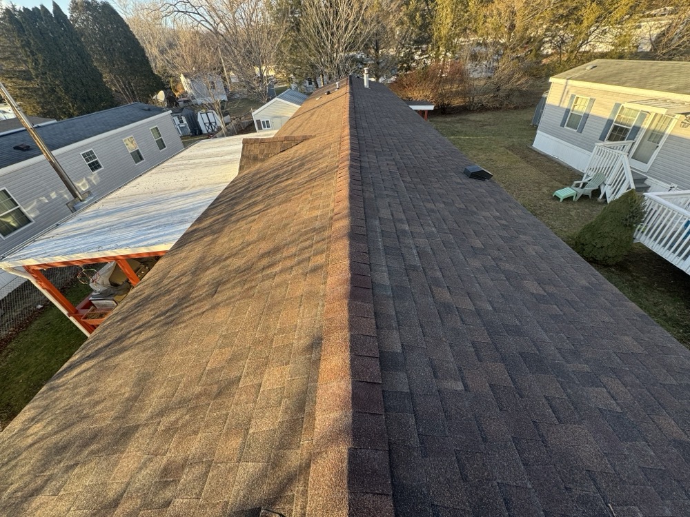 Completed roof with new shingles